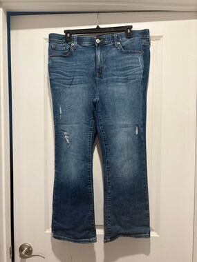 torrid Medium Blue Flare Jeans with Subtle Distressing